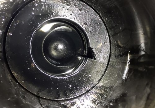 Hole in a piston